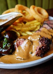 A view of the dry aged beef fillet main course served at The Brooklyn