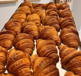 A tray filled with croissants