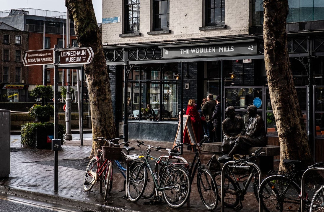 Exterior of a restaurant on a busy city street