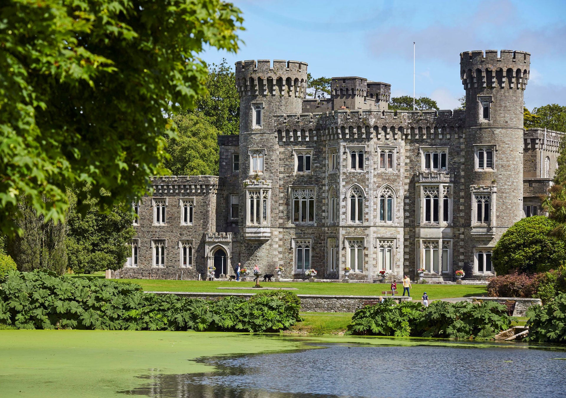 Johnstown Castle Estate exterior of the castle with the lake in front