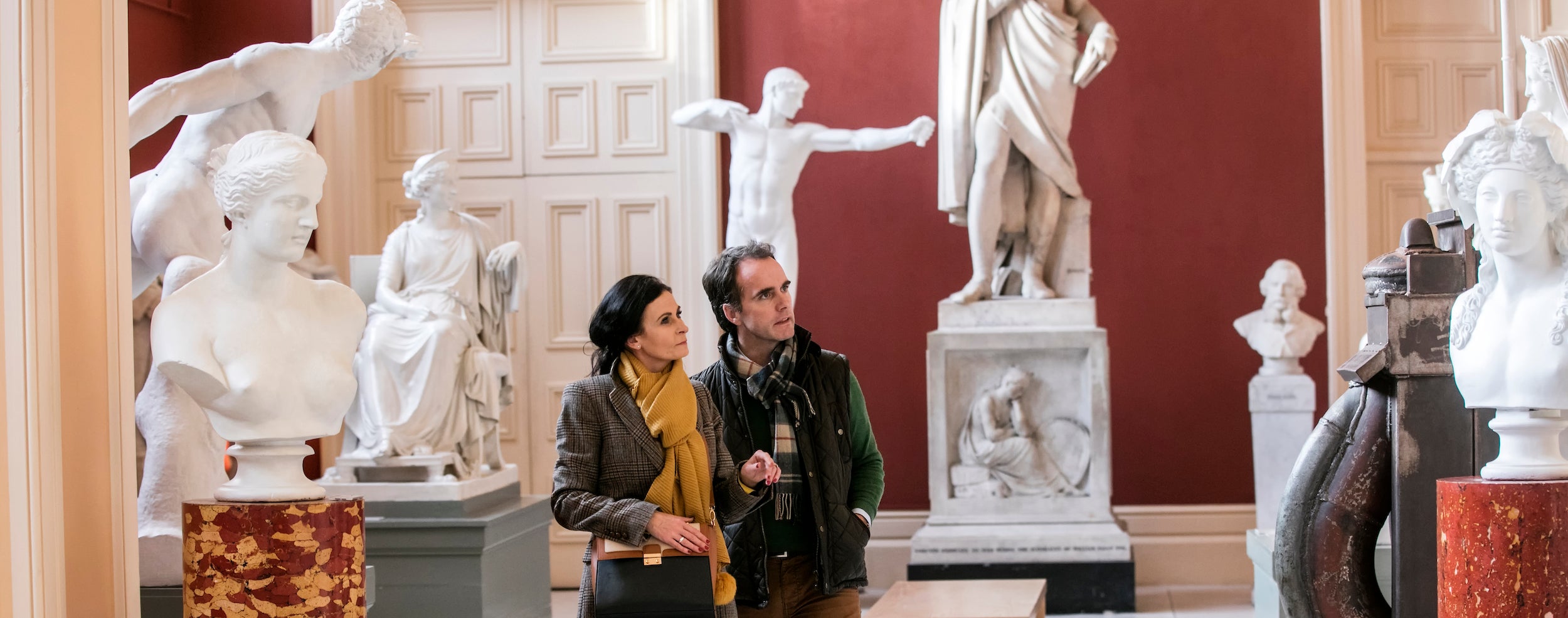 A couple admiring the statues on display at the Crawford Art Gallery in Cork city