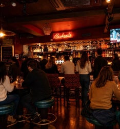 People gathered in the cocktail bar area at Gilbert & Wright, Malahide