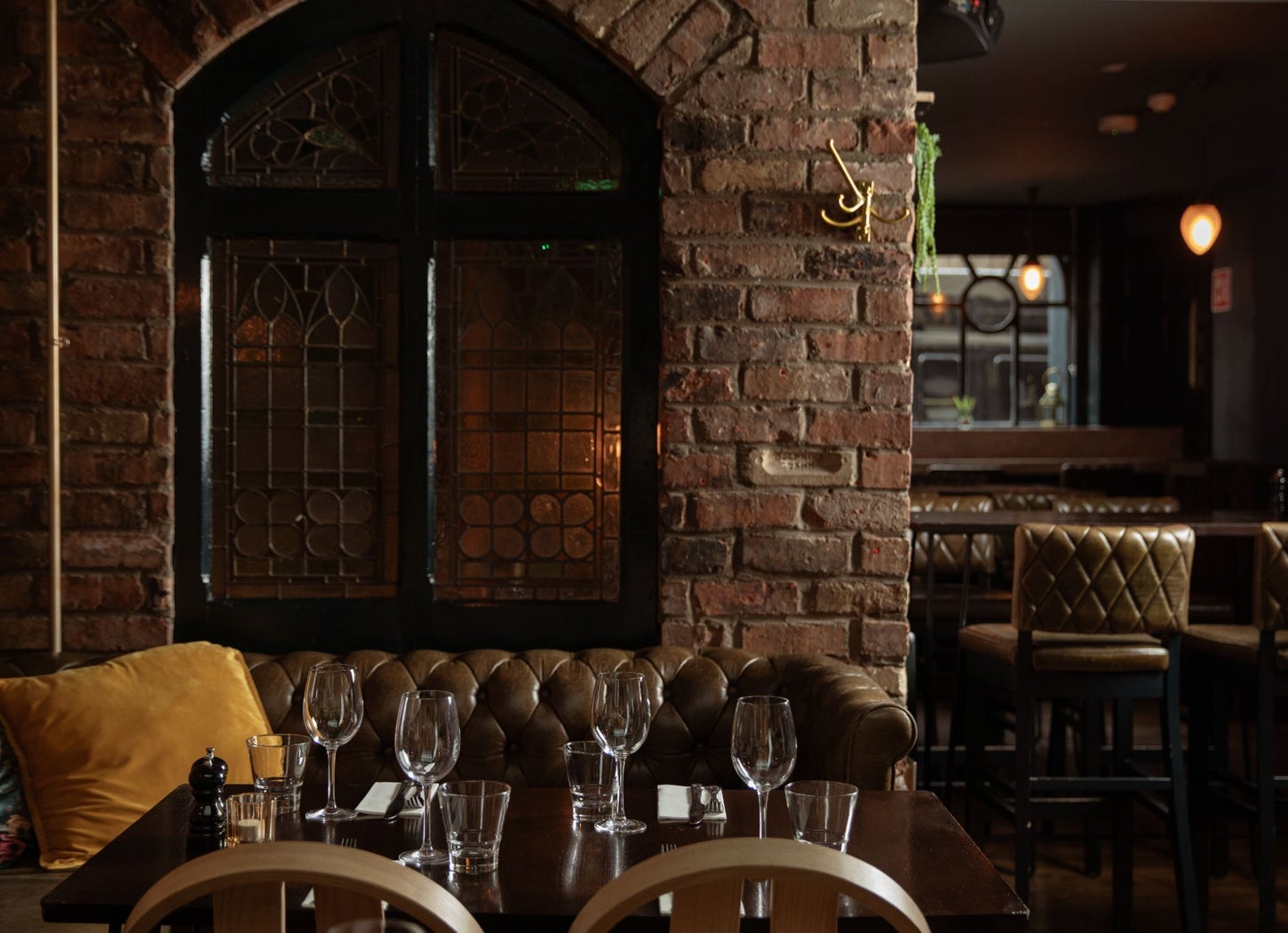 Dark wood tables prepared for dining