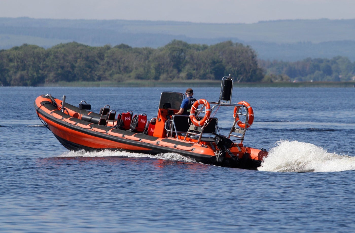An boat and skipper on a lake