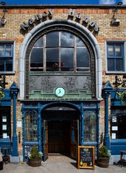 The entrance of Nancy Hands Bar & Restaurant with the specials board on display outside