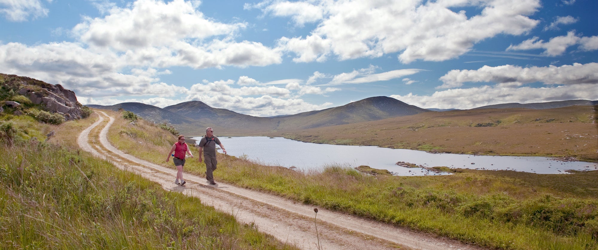 Two people walking the trails at Glenveagh National Park in County Donegal.