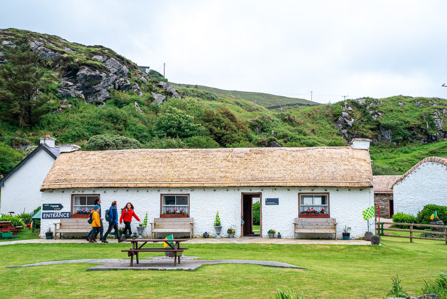 People visiting Glencolmcille Folk Village in Co Donegal