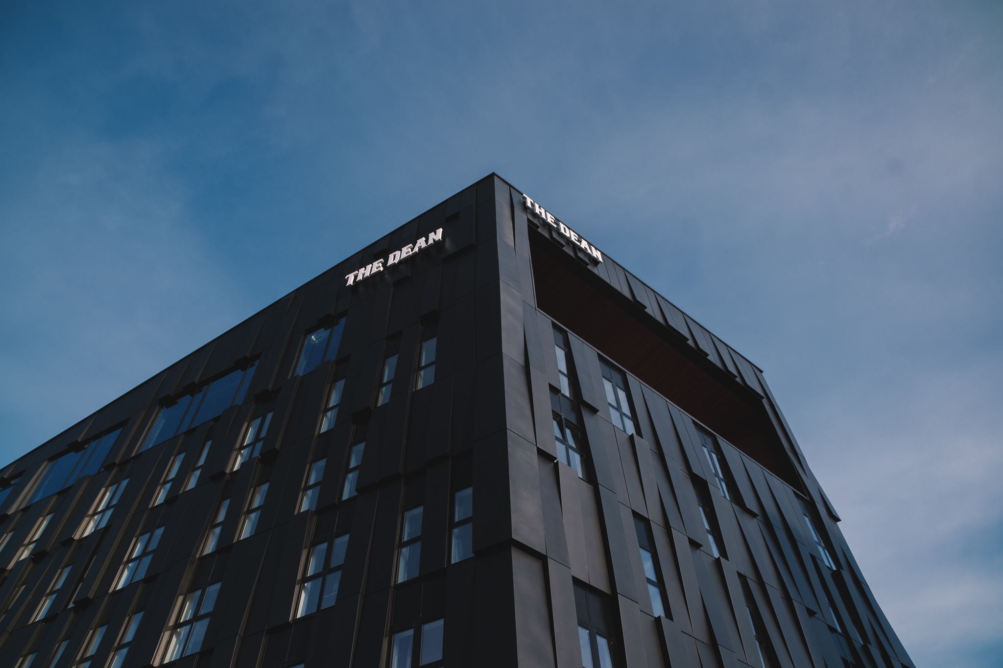 Outside view looking up at the building