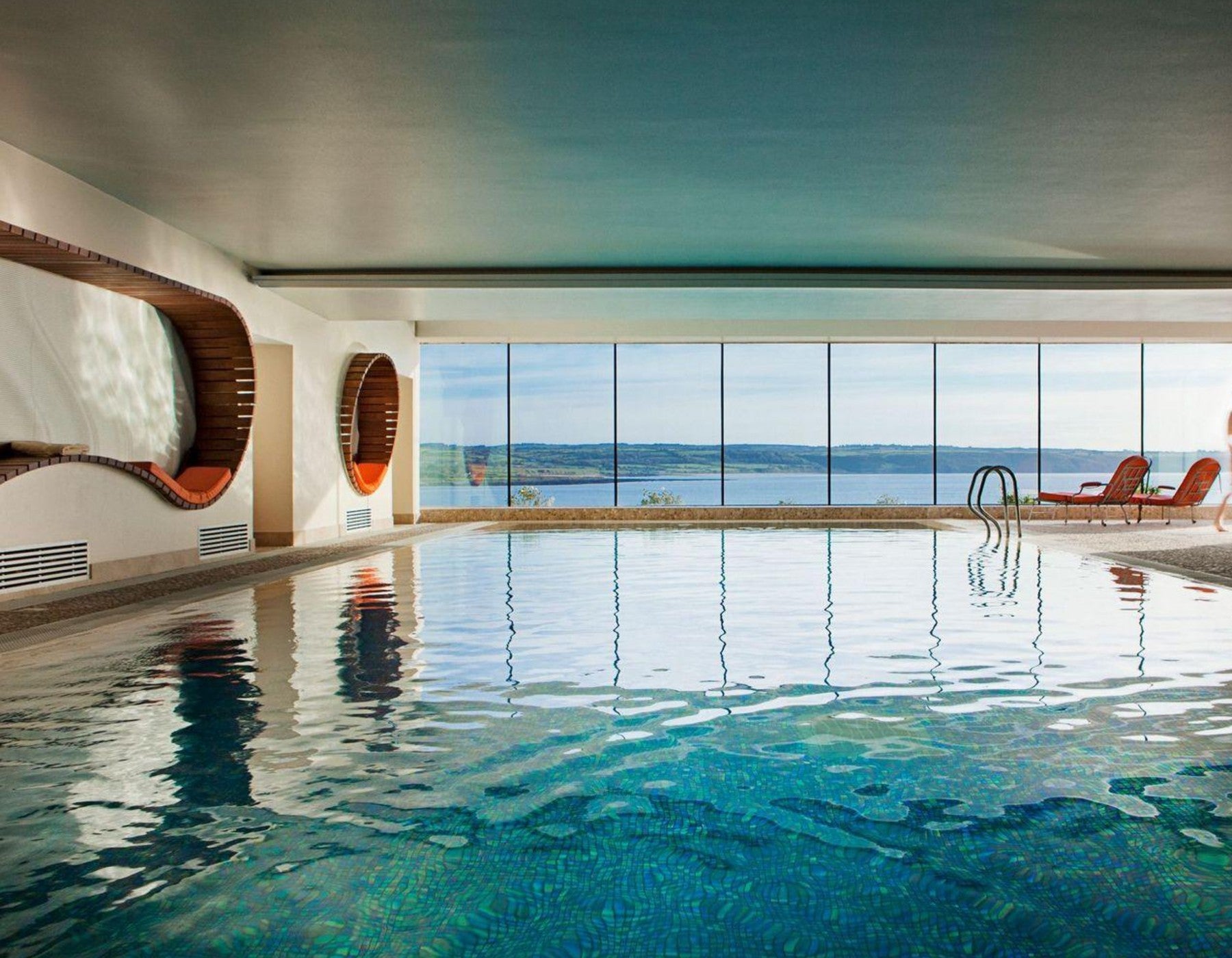 Indoor infinity edge swimming pool at The Well by the Sea Spa at the Cliff House Hotel