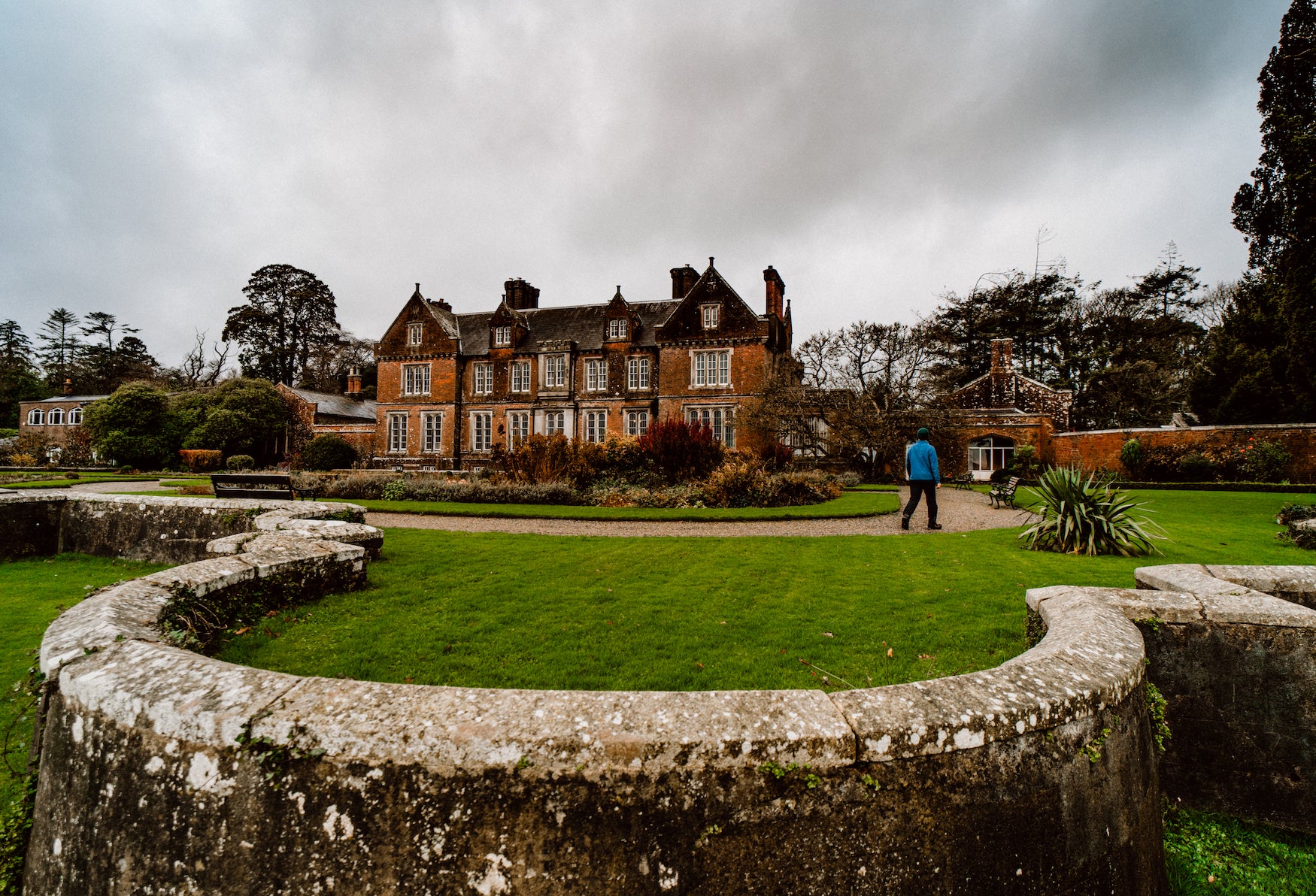 A man walking the grounds of Wells House and Gardens in County Wexford