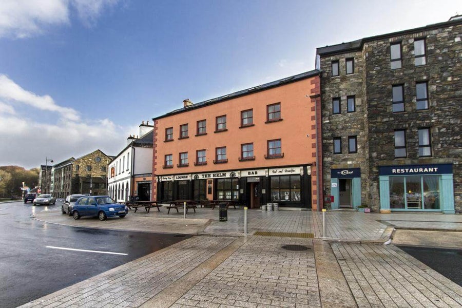 Outside street view of the Helm Bar and Restaurant