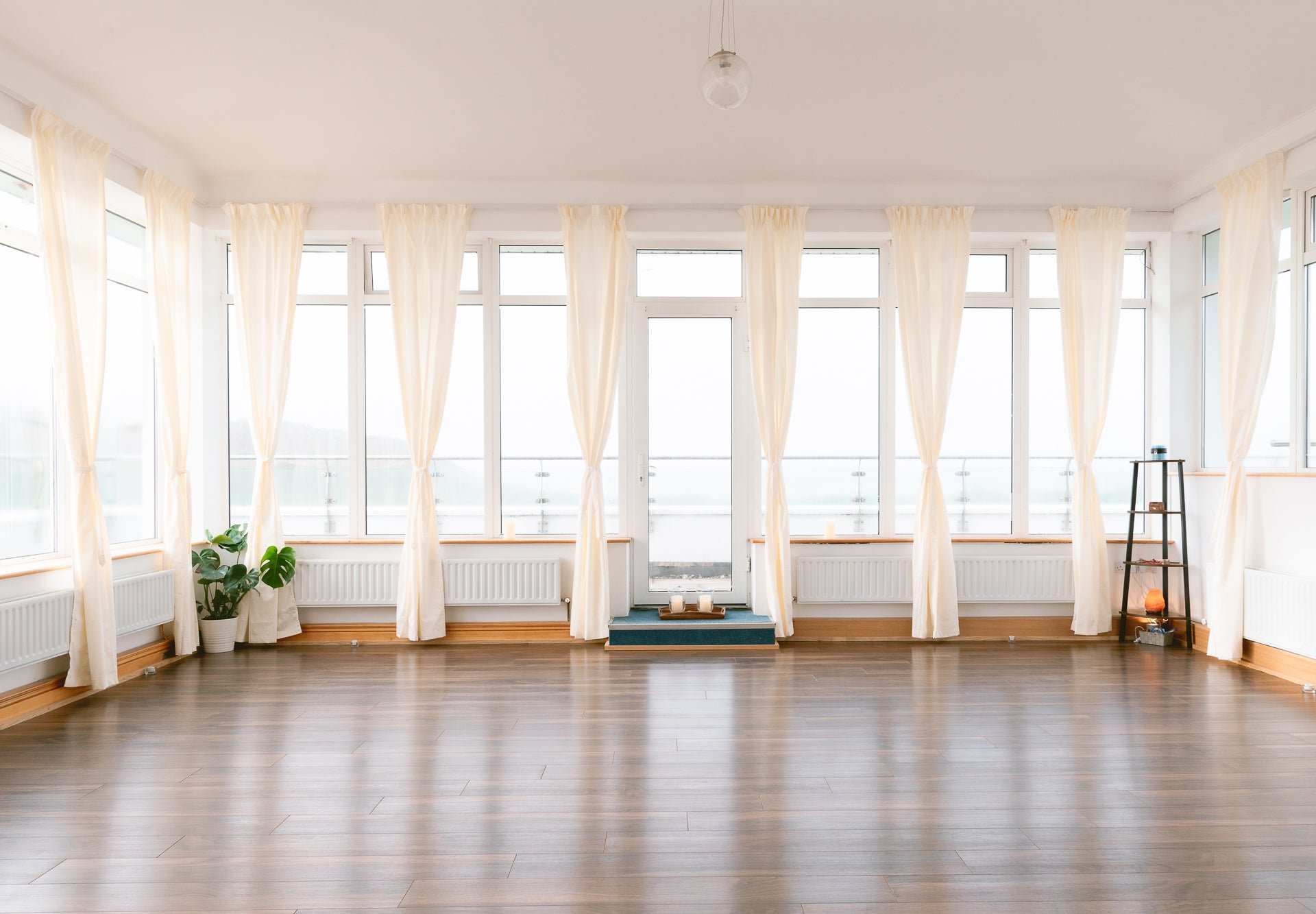 An image of one of Kindred Studios for ballet with open drape curtains allowing natural light in