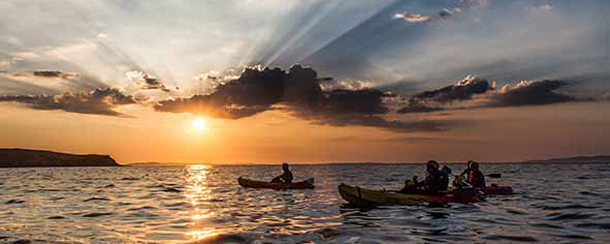 Kayaking at sunset with Real Adventures Connemara Clifden County Galway