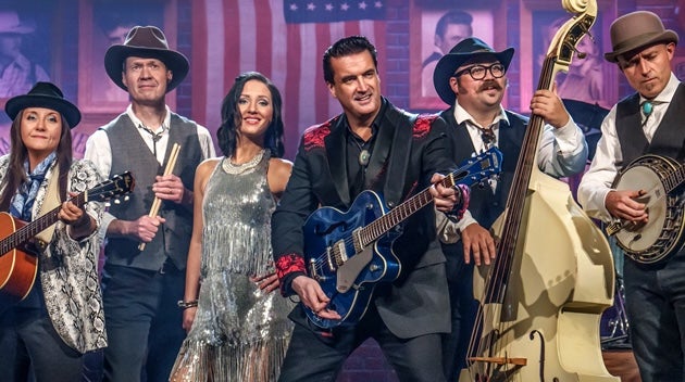 A line of 6 various performers with musical instruments.