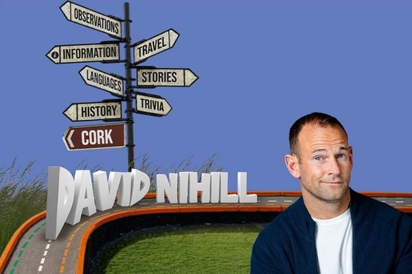 David Nihill: Taking Tangents. A man with rye smile next to a sign post with many signs pointing in various directions.