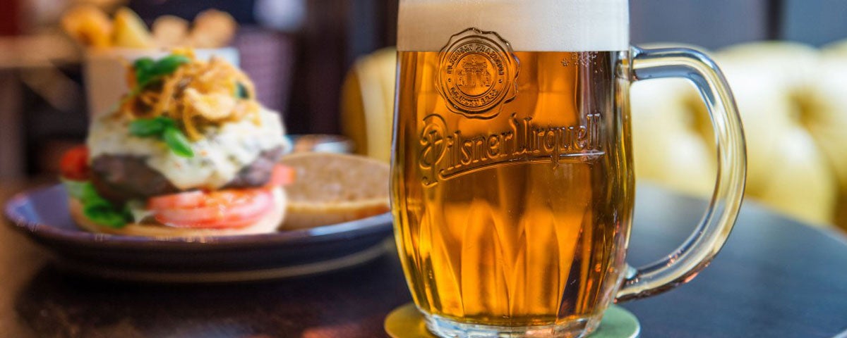 A pint of beer and burger for dinner