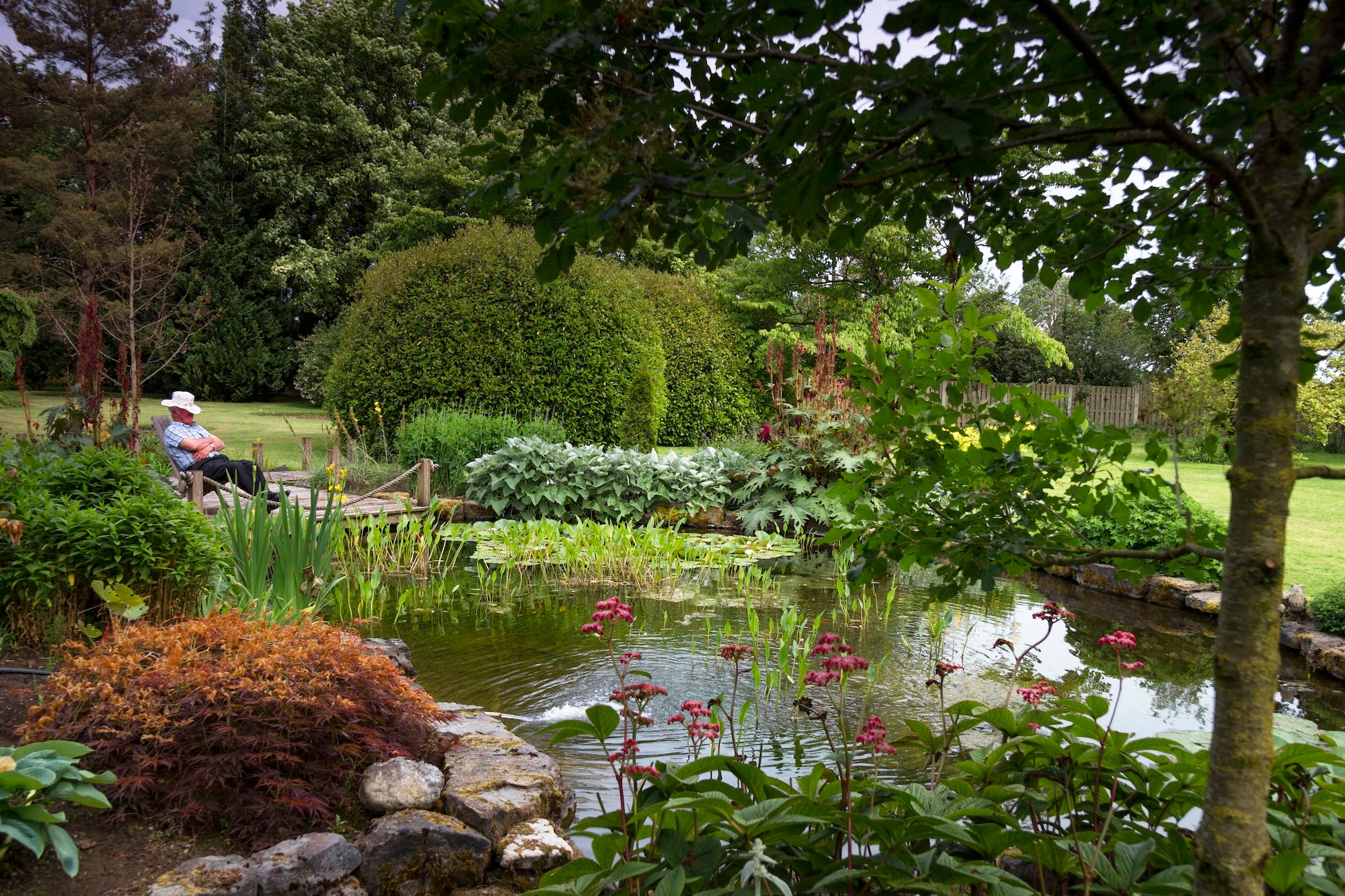 A man sitting in Gash Gardens in Co Laois