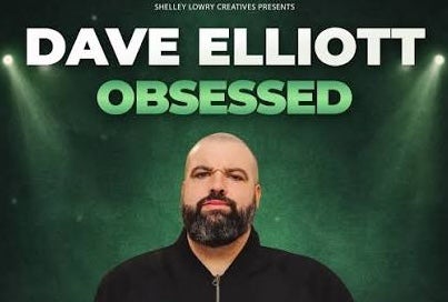 Comedian Dave Elliott, a slightly frowning man with beard and bald head.