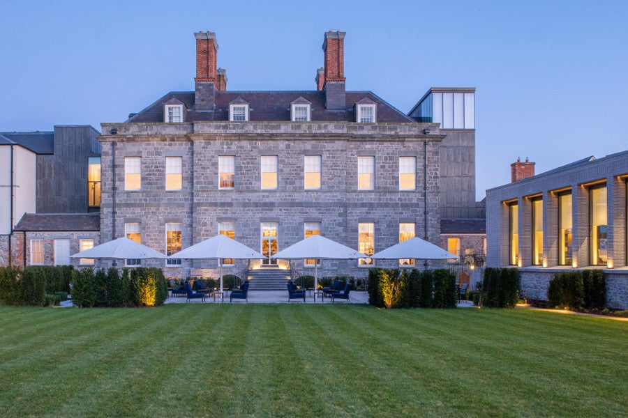 Front view of hotel and gardens