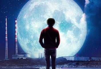 Moonlight - The Philip Lynott Enigma - Rear view of a man walking on cobbled path, silhouetted against a large, bright moon