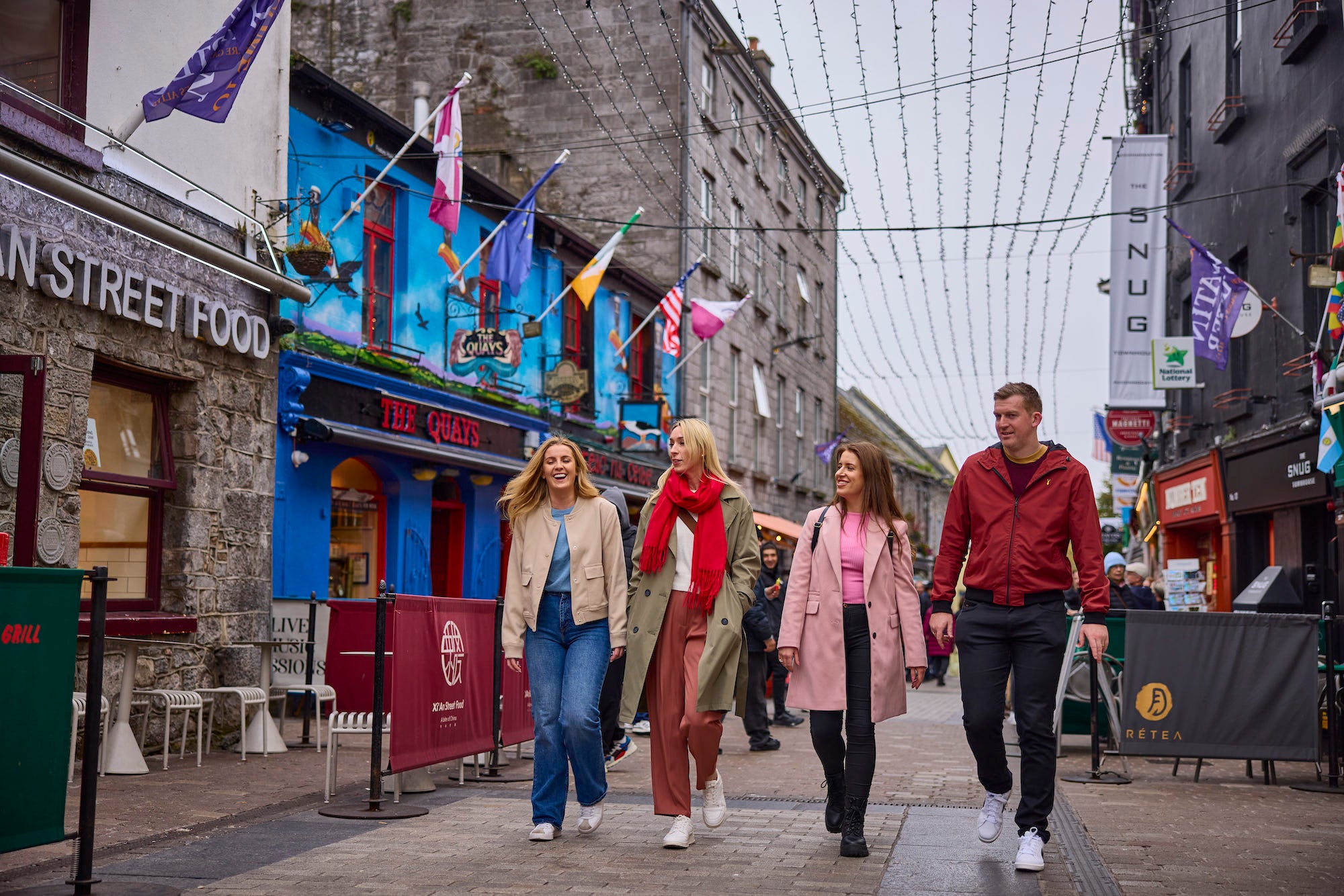 People walking through Galway city