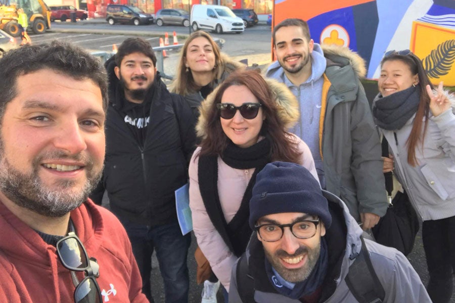 A selfie of a teacher and his students