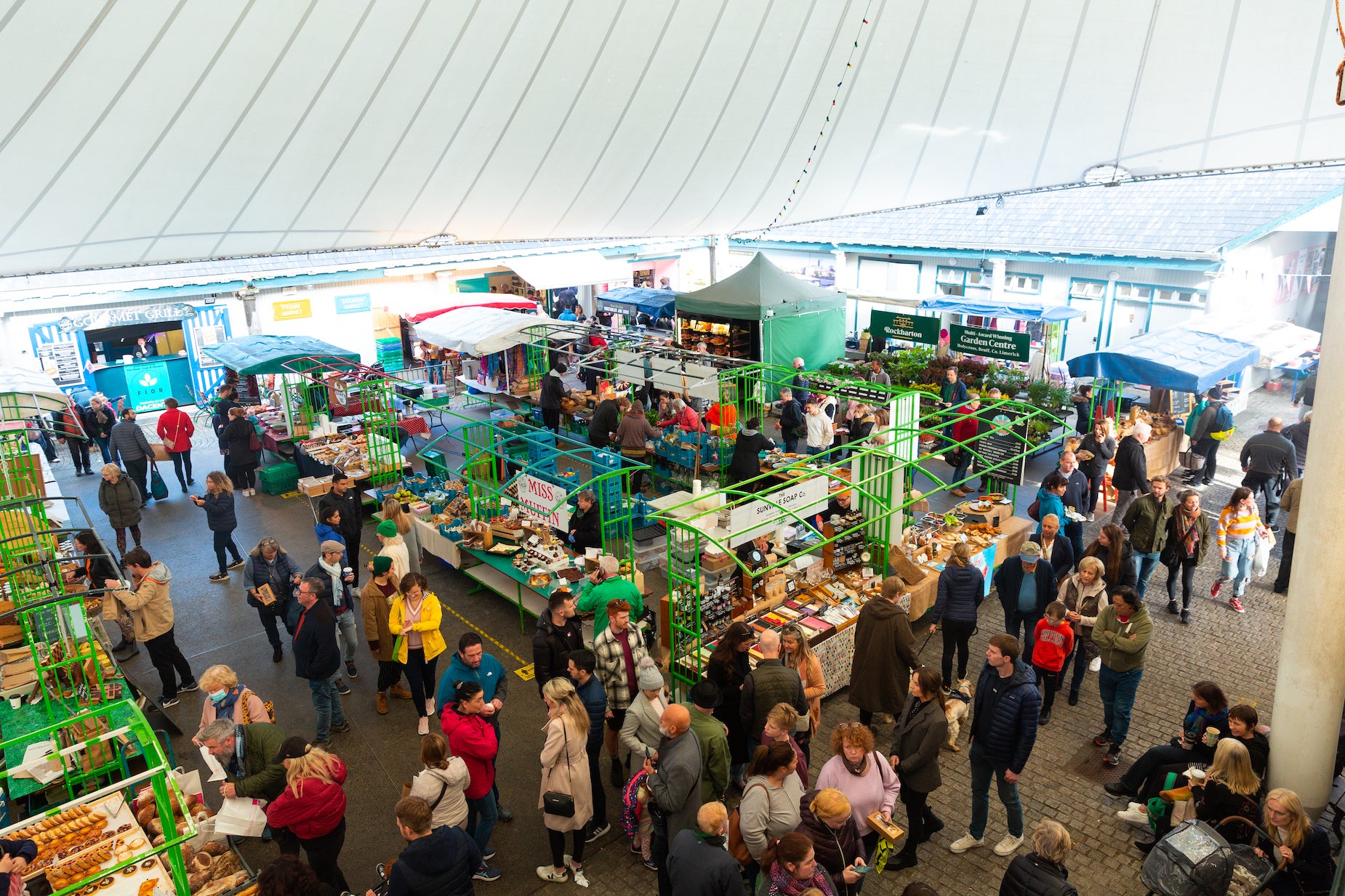 People shopping at The Milk Market in Limerick.