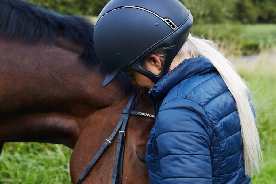 Young girl with a horse