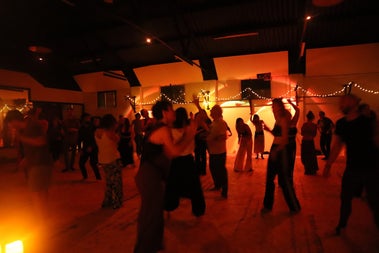 People dancing at an ecstatic dance in Dublin