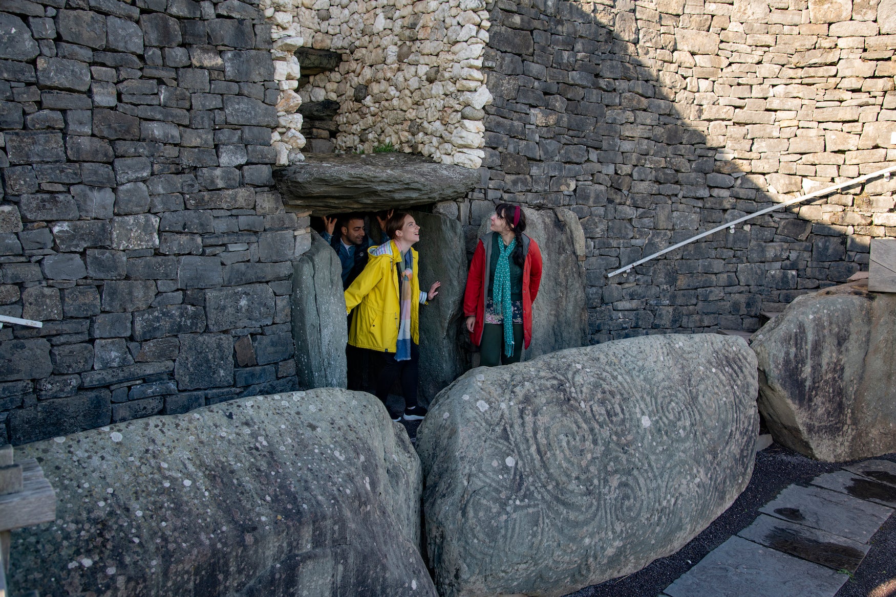 People coming out of the Newgrange passage tomb in Co Louth