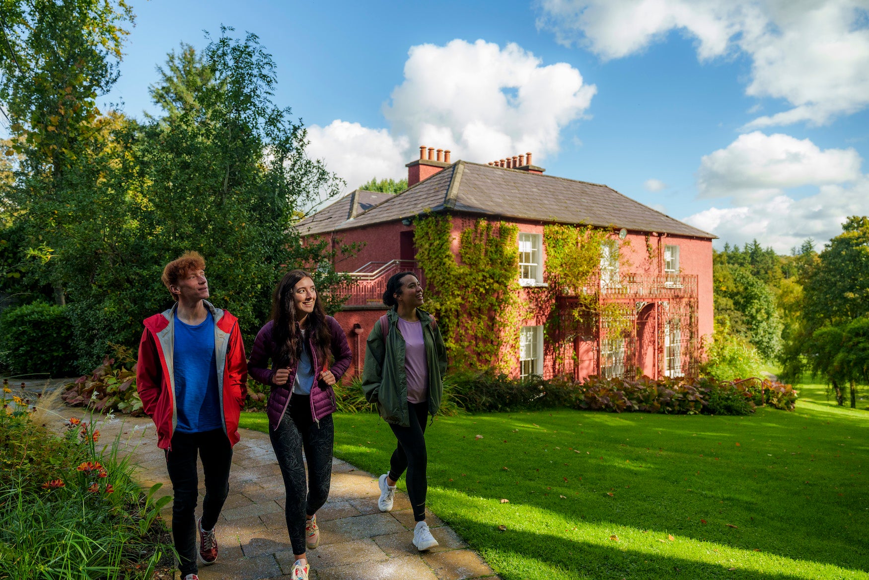 Three people at Glebe House and Gallery in County Donegal