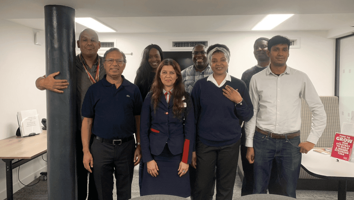 TSSA Emix group members standing together at meeting