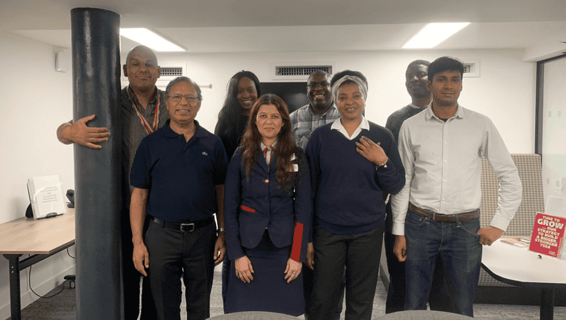 TSSA Emix group members standing together at meeting