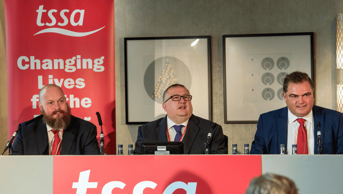 TSSA conference top table, l-r: Treasurer Jason Turvey, President Mick Carney, and General Secretary Manuel Cortes