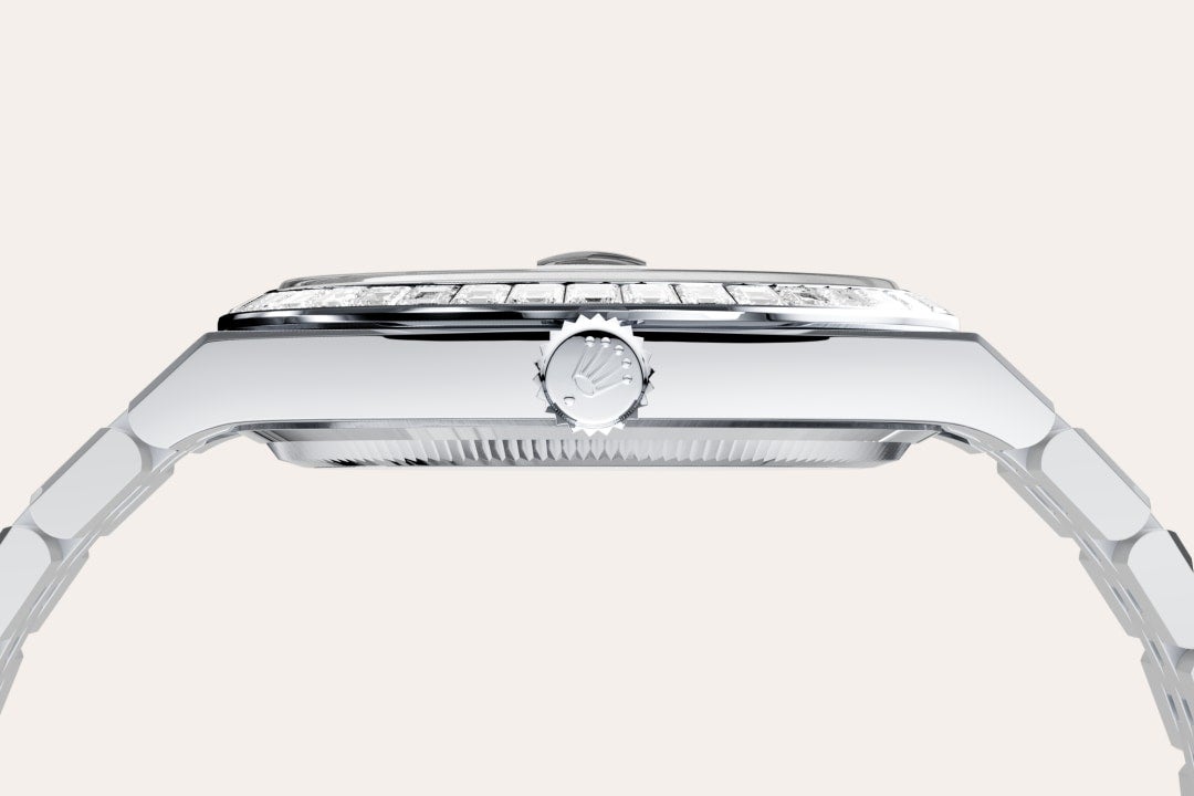 Rolex Land-Dweller 40 in Oyster, 40 mm, platinum and diamonds with a Ice blue, honeycomb motif set with diamonds dial, Set with diamonds bezel, and Flat Jubilee, five-piece solid links bracelet