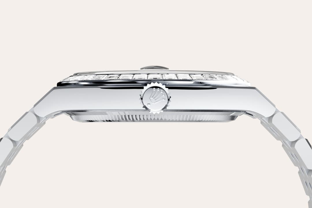 Rolex Land-Dweller 40 in Oyster, 40 mm, platinum and diamonds with a Ice blue, honeycomb motif set with diamonds dial, Set with diamonds bezel, and Flat Jubilee, five-piece solid links bracelet