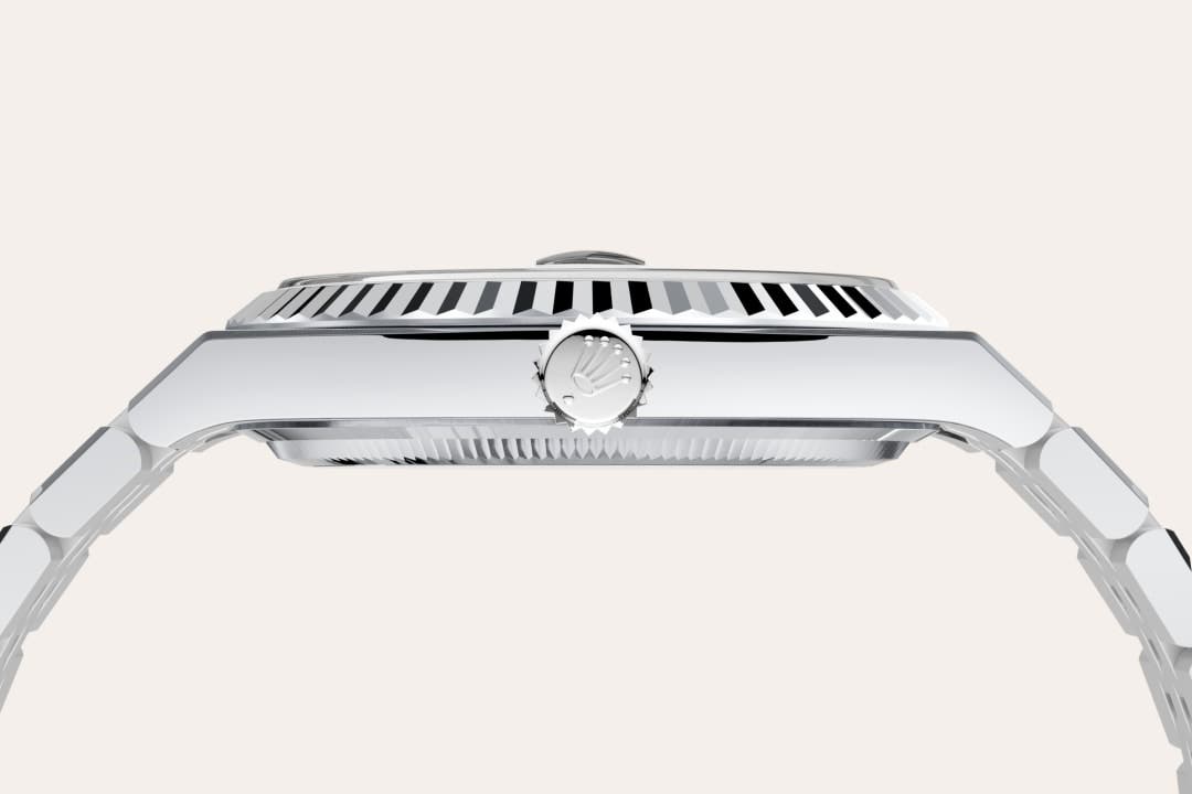 Rolex Land-Dweller 40 in Oyster, 40 mm, platinum with a Ice blue, honeycomb motif dial, Fluted bezel, and Flat Jubilee, five-piece solid links bracelet