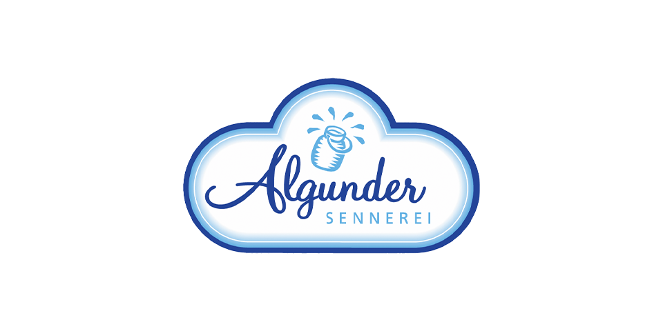 Logo der Molkerei Lagundo, mit der Aufschrift "Algunder Sennerei" und einer stilisierten Milchkanne, die von einem blauen wolkenförmigen Rahmen umgeben ist.