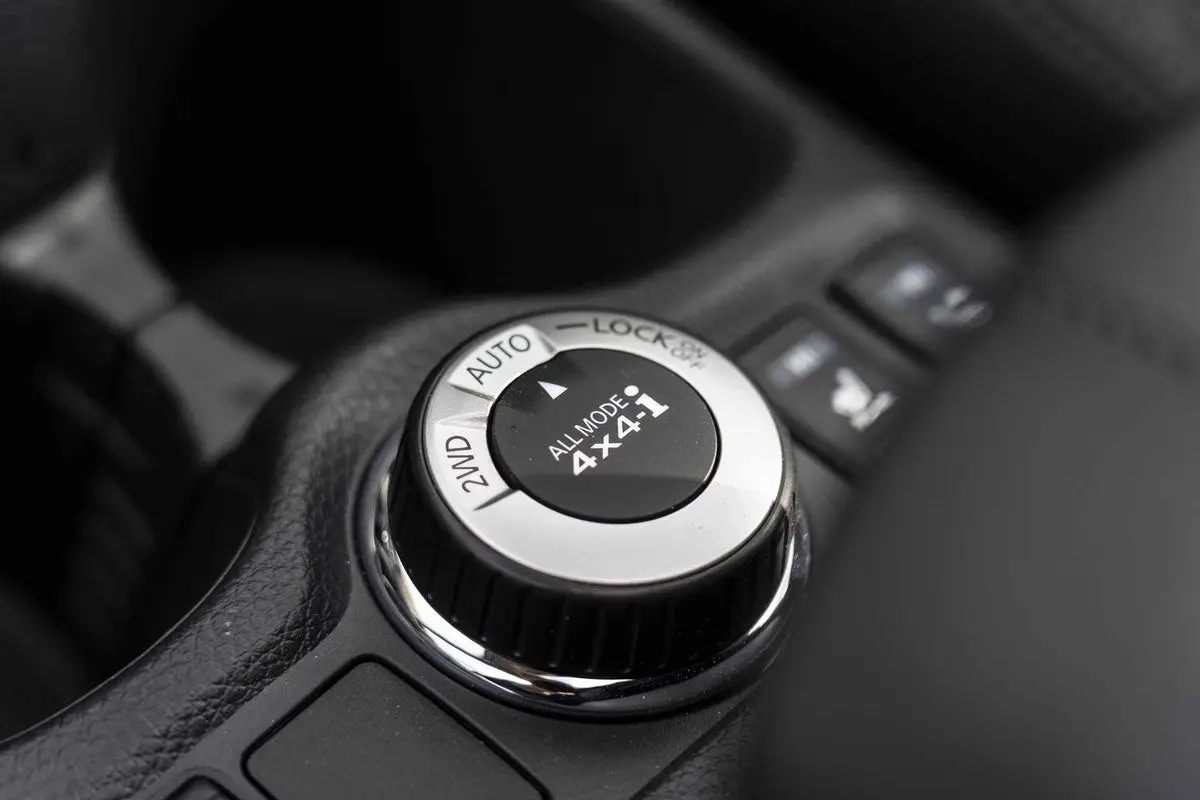 Nissan X-Trail (2013-2022) Review: interior close up photo of the Nissan X-Trail drive modes
