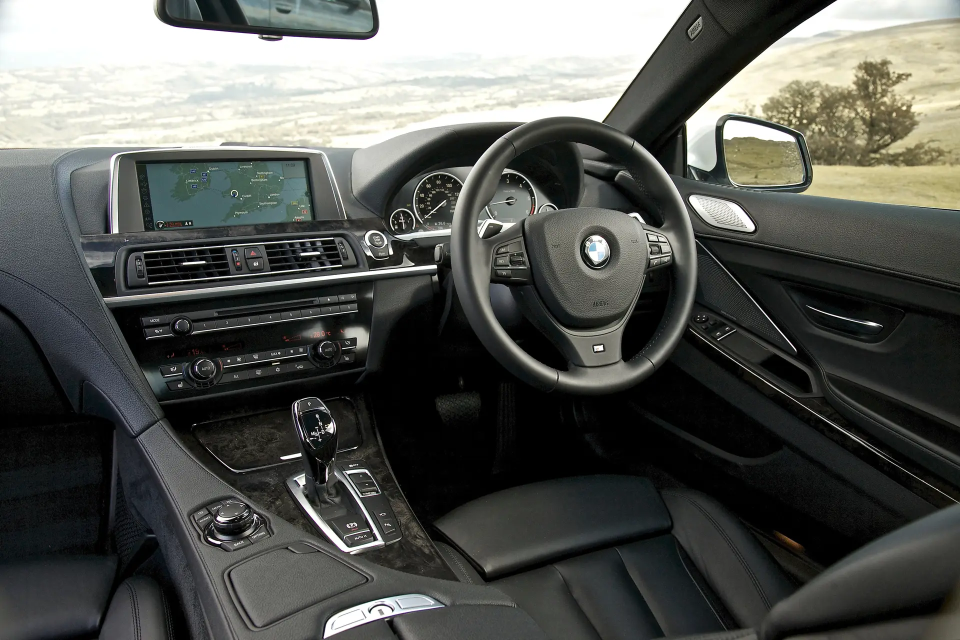 BMW 6 Series (2011-2018) Review: interior close up photo of the BMW 6 Series dashboard