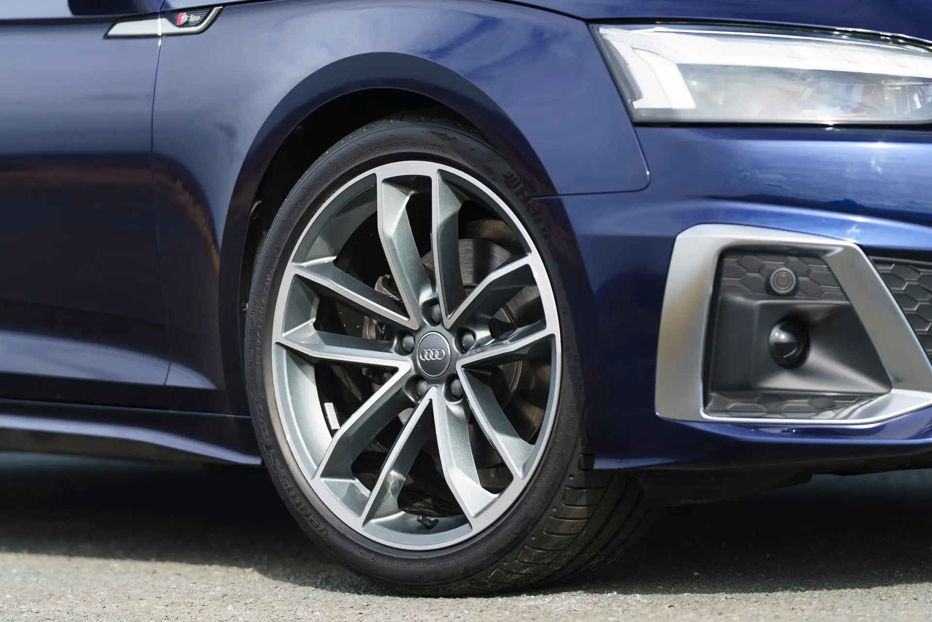 Audi A5 Sportback Review 2023: exterior front three quarter photo of the Audi A5 Sportback alloy wheel
