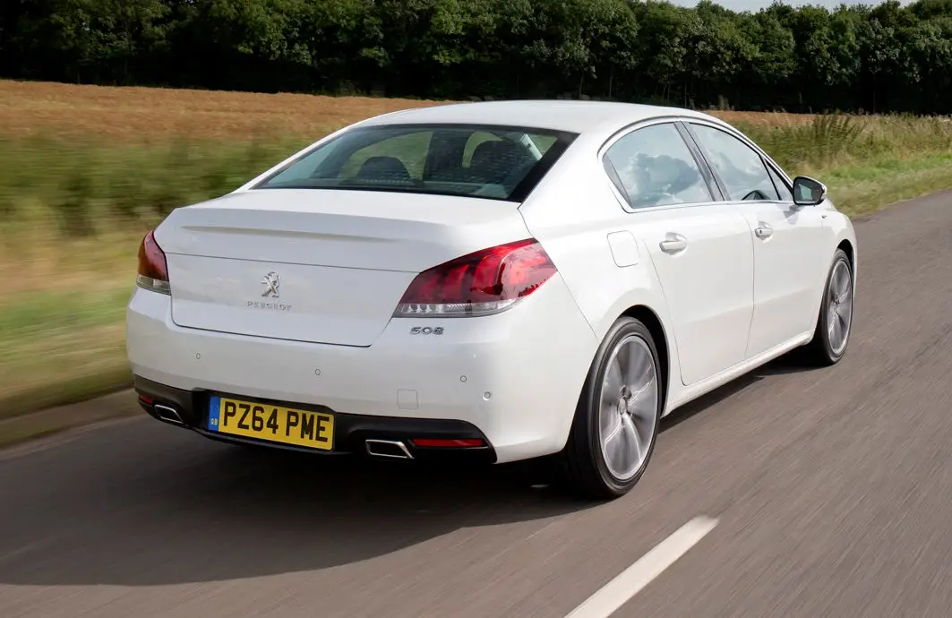 Peugeot 508 (2011-2018) Review: exterior rear three quarter photo of the Peugeot 508 on the road