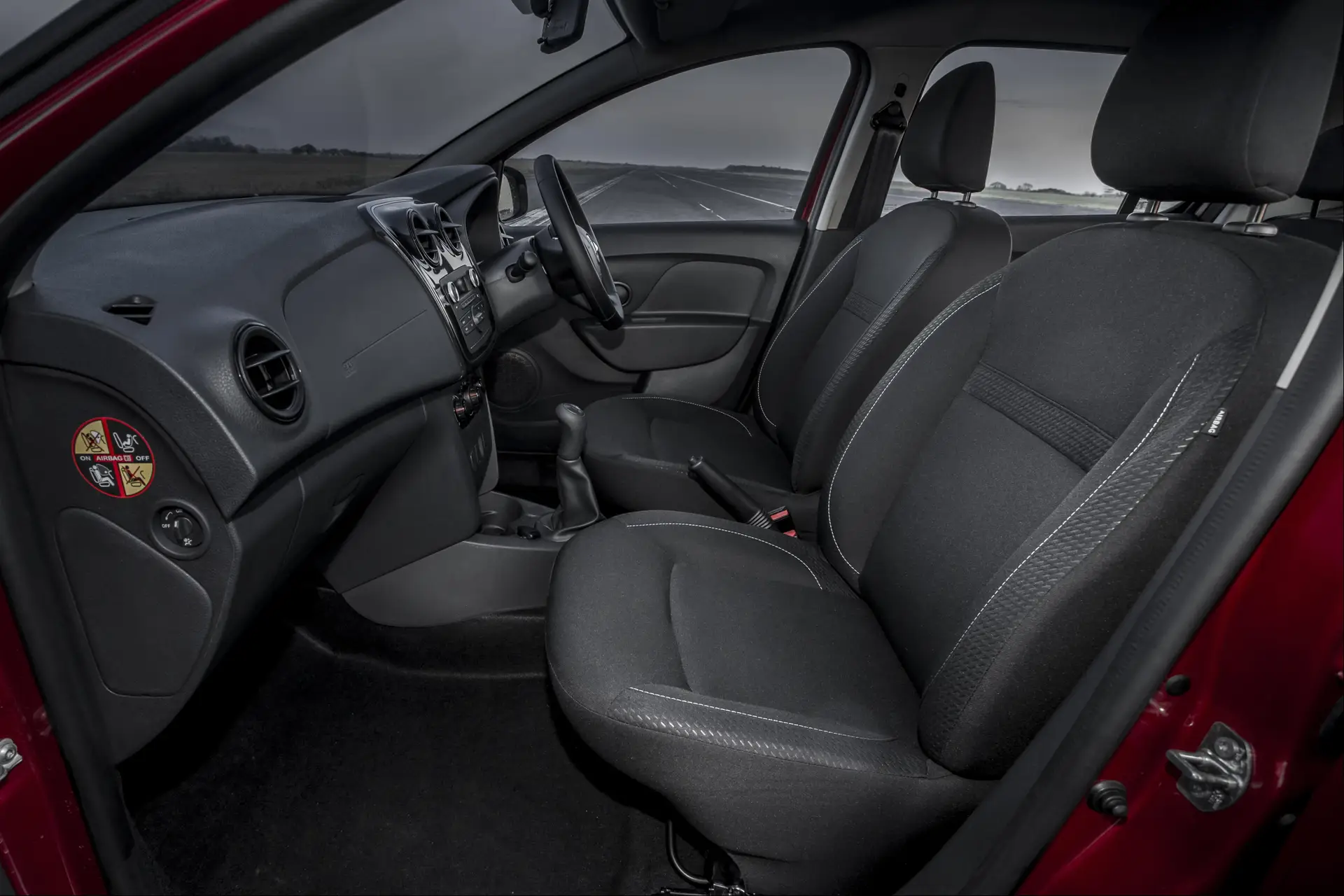 Dacia Sandero (2013-2021) Review: interior close up photo of the Dacia Sandero front seats