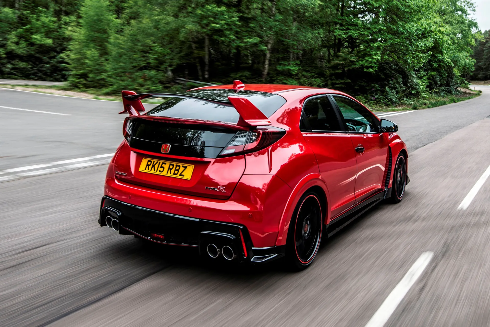 Honda Civic Type R (2015-2017) Review: exterior rear three quarter photo of the Honda Civic Type R on the road