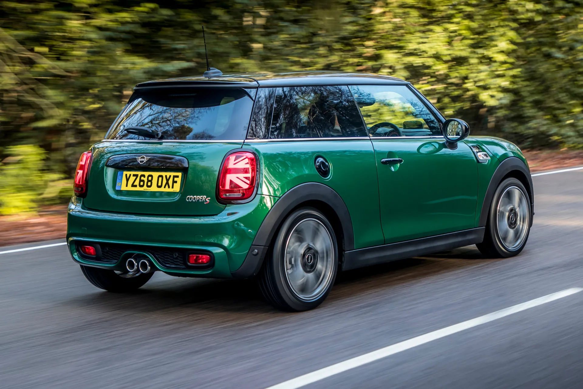 MINI Hatch (2014-2024) Review: exterior rear three quarter photo of the MINI Hatch 3-door on the road