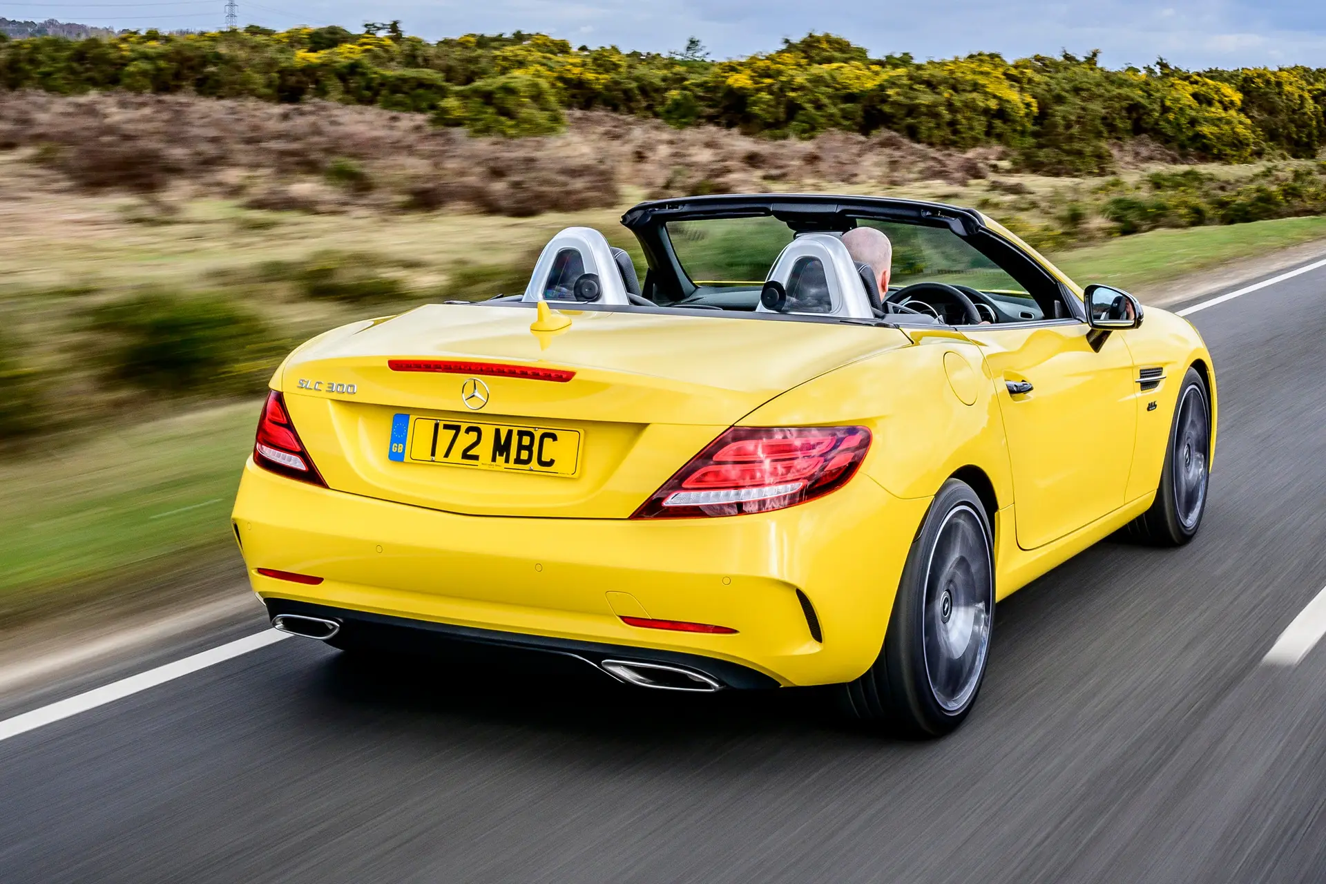 Mercedes-Benz SLC (2016-2020) Review: exterior rear three quarter photo of the Mercedes-Benz SLC on the road