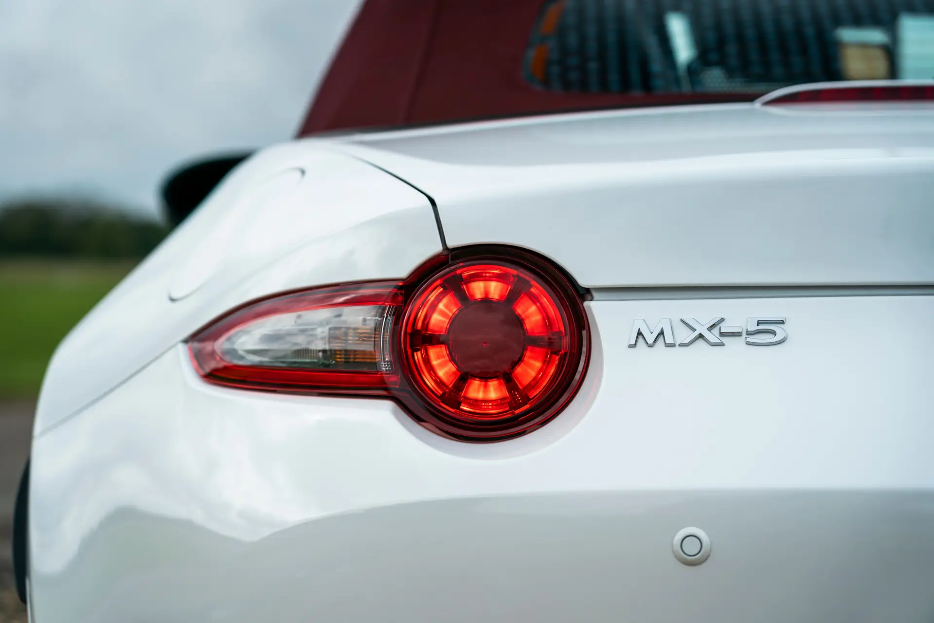 Mazda MX-5 Review 2023: exterior rear close up photo of the Mazda MX-5 rear light
