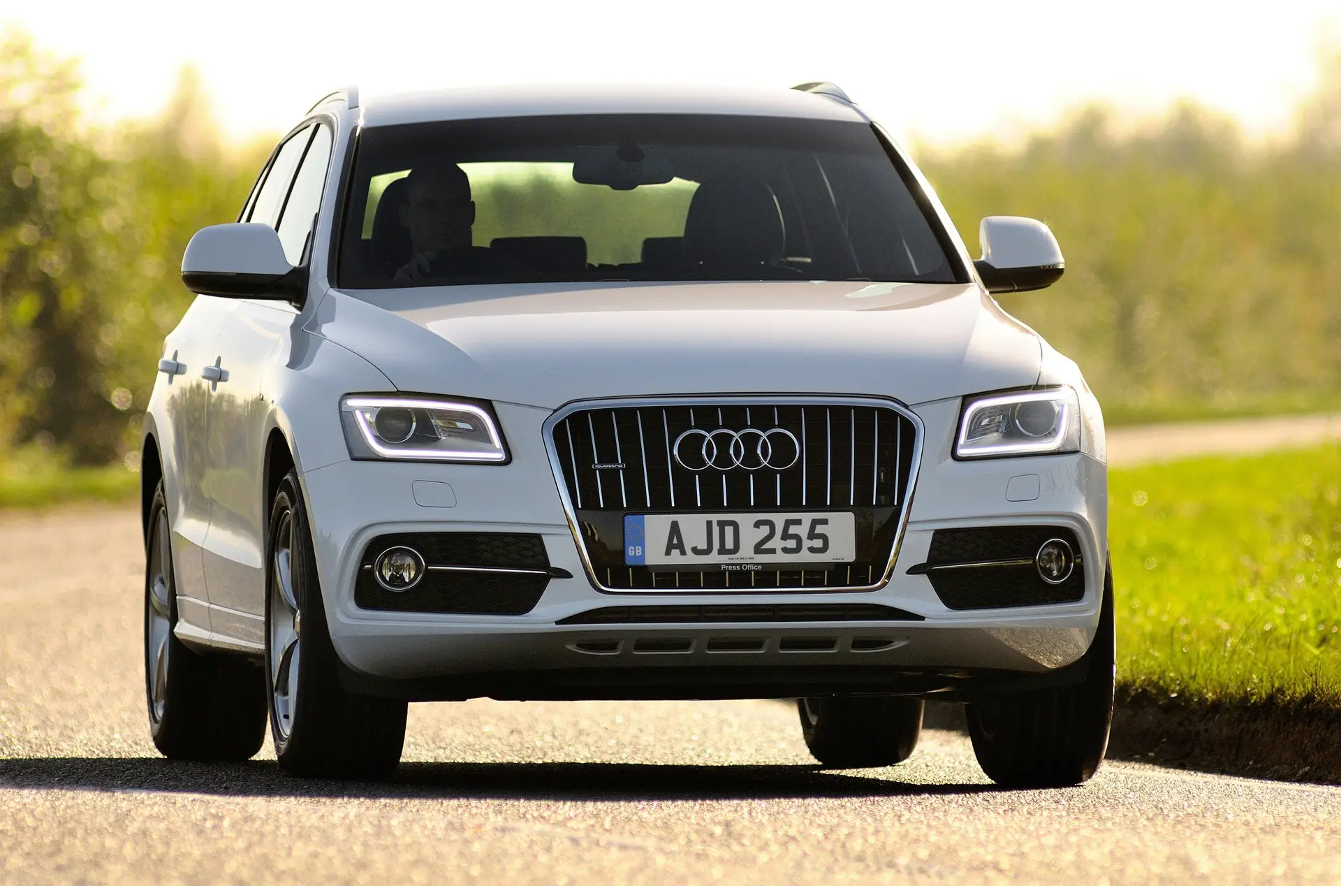 Audi Q5 (2008-2017) Review: exterior front three quarter photo of the Audi Q5 on the road