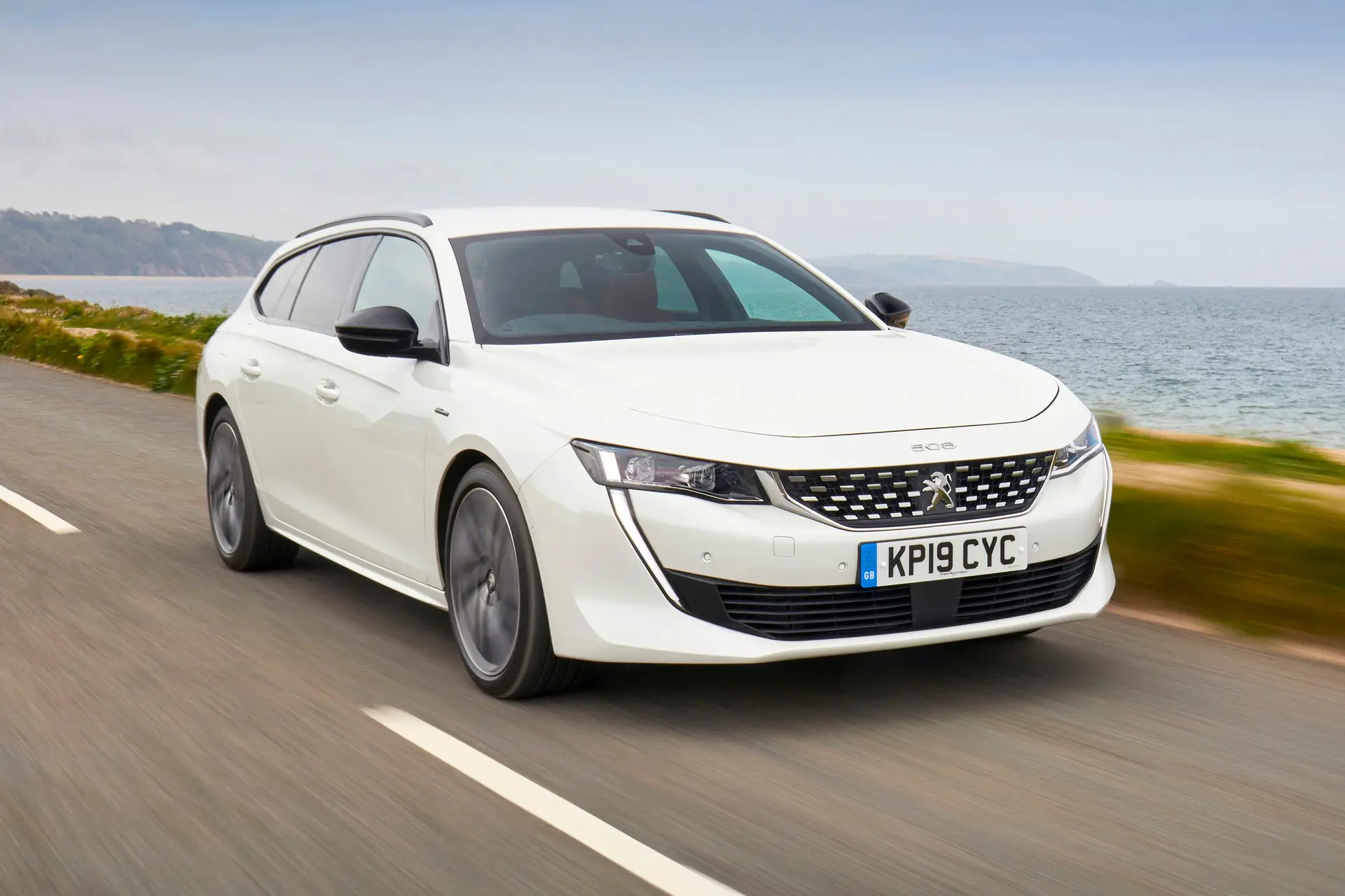 Peugeot 508 SW Review 2023: Exterior front three quarter photo of the Peugeot 508 SW on the road