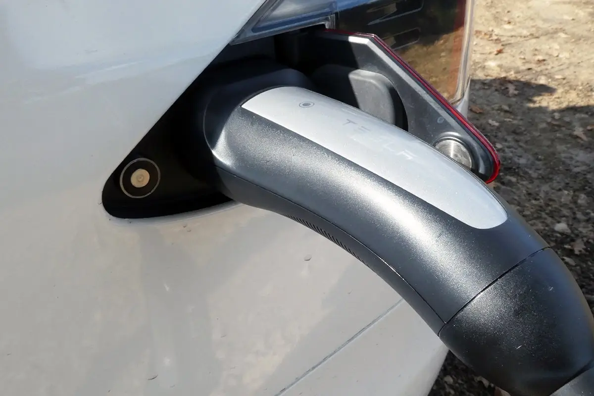 Tesla Model S Review 2023 Review: Interior close up photo of the Tesla Model S charging port